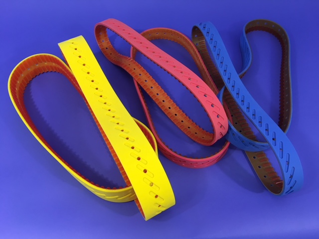 Courroies d'ensacheuses perforées