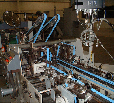 Courroie plate pour les machines plieuses ou colleuses dans l'industrie du carton